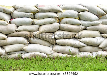 Sand bags help keep flood waters out of a town  Process Flood protection