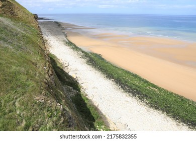 Sand beach and cliff in Département Calvados, Normandy, France