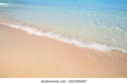 Sand beach sea on sun light with sea wave. - Shutterstock ID 2251496307