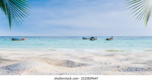 Sand beach seaside vacation on daylight with traditional boats on sea on blue sky background and free space for editing display product or text promote your projects tourism in summer season  