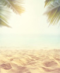 Sand With Blurred Palm And Tropical Beach Bokeh Background, Summer Vacation And Travel Concept. Copy Space