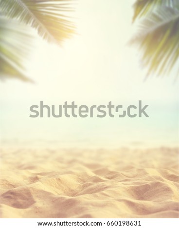 Sand with blurred Palm and tropical beach bokeh background, Summer vacation and travel concept. Copy space