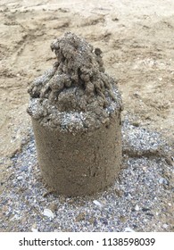 Sand Castel On The Beach Made By A Child, Close Up, Isolated, Selective Focus