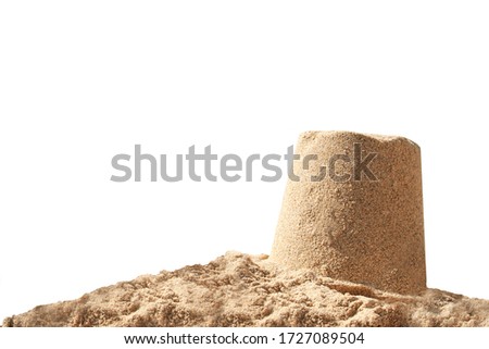 Sand castle isolated on white background