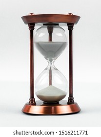 Sand Clock Time Concept With Hourglass Lying Toned In Warm Bronze, Retro Style, Vertical Orientation.