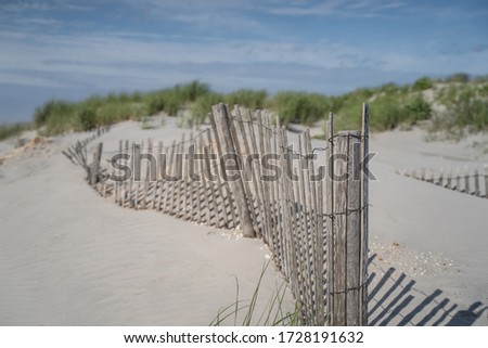 Sand dunes against blue sky background, Avalon, New Jersey