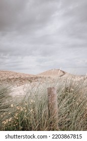 Sand Dunes With Grass And A Stormy Sky In Germany Baltic Sea