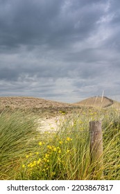 Sand Dunes With Grass And A Stormy Sky In Germany Baltic Sea