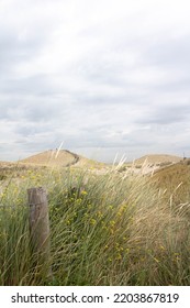 Sand Dunes With Grass And A Stormy Sky In Germany Baltic Sea