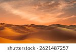 Sand dunes in the Sahara Desert at amazing sunrise, Merzouga, Morocco - Orange dunes in the desert of Morocco - Sahara desert, Morocco