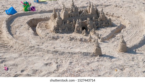 Sand Figures By The Sea In Summer By Unknown Author