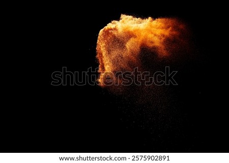 Sand flying explosion isolated on black background ,throwing freeze stop motion object design.