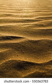 The sand gets blown