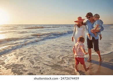 Sand, holiday and walking for family, beach and bonding in trip, fun and outdoor in California. Sea, peace and children with parents, waves and water of ocean, relax and man with woman together - Powered by Shutterstock