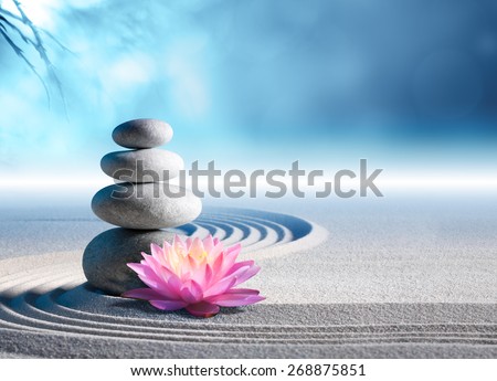 sand, lily and spa stones in zen garden
