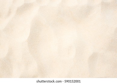 Sand on the beach as background - Shutterstock ID 590152001