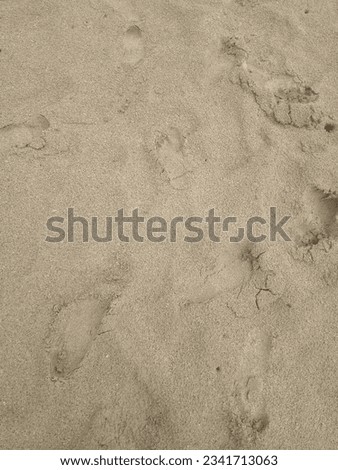 The sand on the beach is so soft and there are footprints