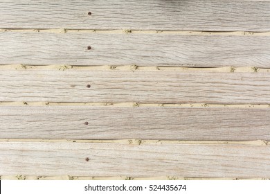 Sand On Planked Wood. Summer Background With Copy Space. Top View. Close Up Shot Of A Wooden Beach Path Texture With Some Sand