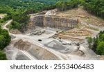 Sand open-pit mining quarry with processing plant for crushed stone. Extracting of natural resources for construction industry