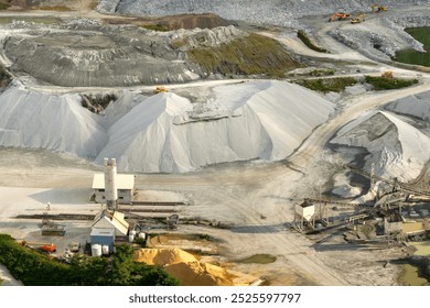 Sand open-pit mining quarry with processing plant for crushed stone. Extracting of natural resources for construction industry