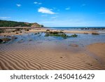 Sand ripples and tide pool at Osgodby Point (Knipe Point) in Cayton Bay, Scarborough, North Yorkshire, Yorkshire, England, United Kingdom, Europe