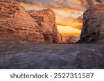 Sand road ground and Yardang landform mountain natural landscape at sunrise. Car background.