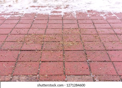 Sand Salt And Soda Solution On The Sidewalk Against The Slippery, Close-up