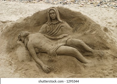 Sand sculpture of Jesus and Mary