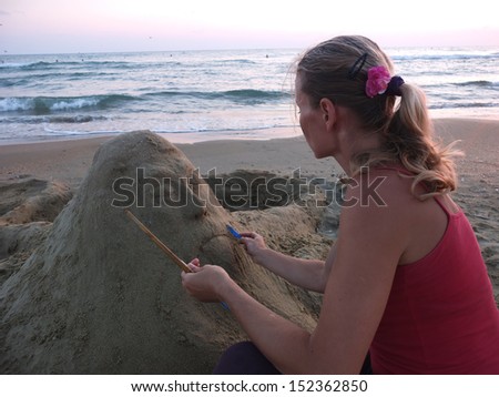 sand sculpture and the sculptor