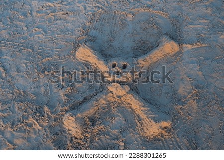 Sand Sculpture of an skull late evening