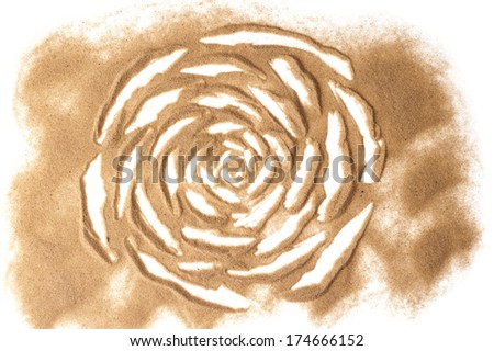 Sand sculptured rose isolated in white