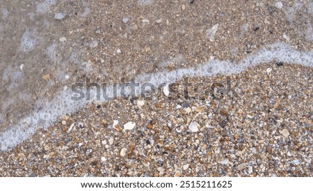 Similar – Lots of colorful stones on the beach