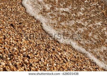 Similar – Lots of colorful stones on the beach