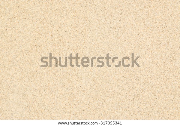 Sand Texture. Brown sand. Background from fine
sand. Sand background