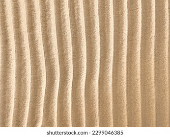 Sand. Texture, surface of sea sand. Natural background. Close-up. Waves of sand. Dunes. Copy space - Powered by Shutterstock