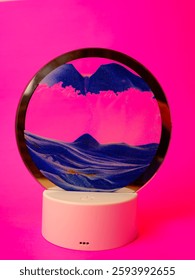Sand timer creating a mountain landscape, combining time with nature in a unique and artistic decor piece