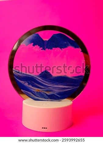 Sand timer creating a mountain landscape, combining time with nature in a unique and artistic decor piece