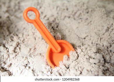 Sand Toys In A Sandbox