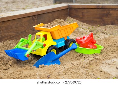 Sand toys in a sandbox / Sand toys