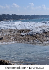 Sand Volcanos And Pancake Ice At Grand Haven Beach On Lake Michigan