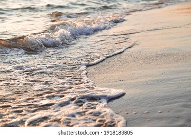 Sand And Waves On The Beach