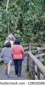 Sandakan, Sabah - Dec 22, 2018 : view of the environment/atmosphere at Sepilok Orangutan rehabilitation center. Tourists are walking towards Sepilok Orangutan rehabilitation centre , Sandakan Sabah