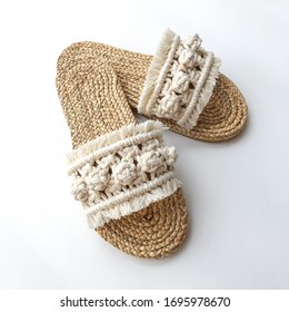 Sandal natural straw shoes isolated woven product macrame work, shoes pack shot, macrame sandals in white background, Bali beach summer traditional craft diy hobby ethnic boho chic Morocco style shoes