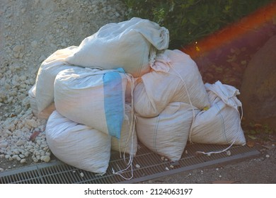 Sandbags For Flood Control. Measures To Prevent Flooding Of Houses.