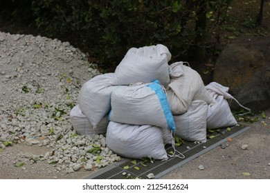 Sandbags For Flood Control. Measures To Prevent Flooding Of Houses.