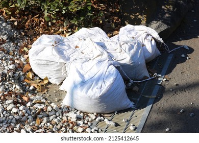 Sandbags For Flood Control. Measures To Prevent Flooding Of Houses.