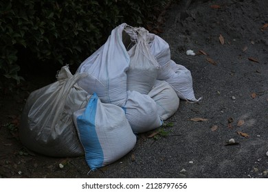 Sandbags For Flood Control. Measures To Prevent Flooding Of Houses.