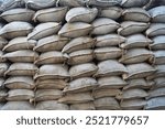 Sandbags for trenches in war or sandbags for flood defense