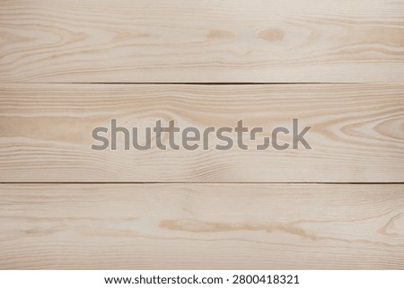 Sanded light pine wood table natural wallpaper