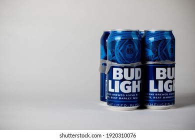 Sandhurst, United Kingdom; February 13th 2021:- Four Cans Of Bud Light Isolated On A White Background